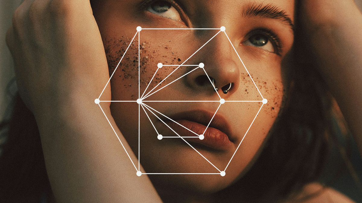 Photo of a girl looking up superimposed with a geometric shape.